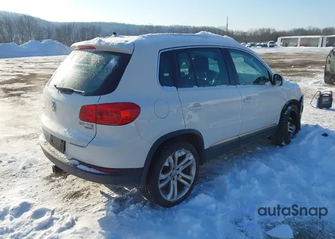 2013 Volkswagen Tiguan Sel z USA, uszkodzony, nr VIN WVGBV3AX1DW617607